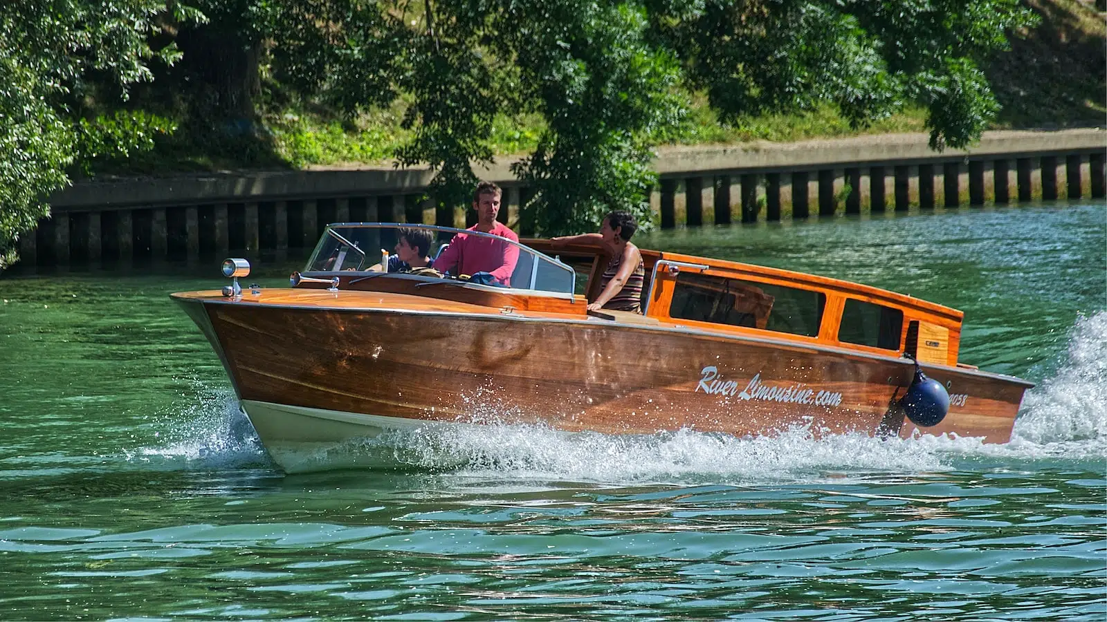 man riding brown boat on water